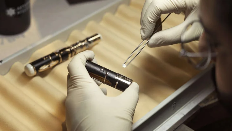 Visitors experiencing The Scholars' Treasure Montblanc collection in Newport Beach, California.